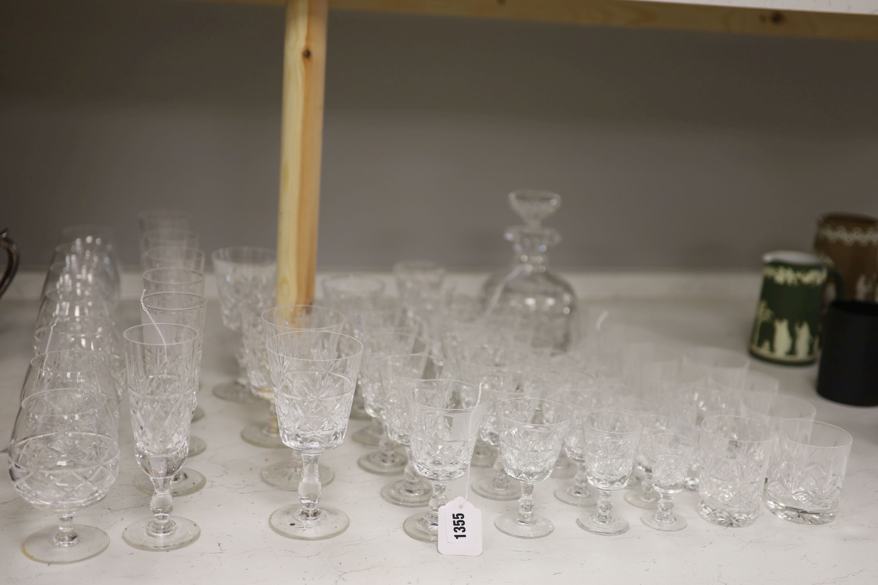 A Brierley cut glass decanter and stopper and a part suite of Brierley 'Bruce' pattern table glass,